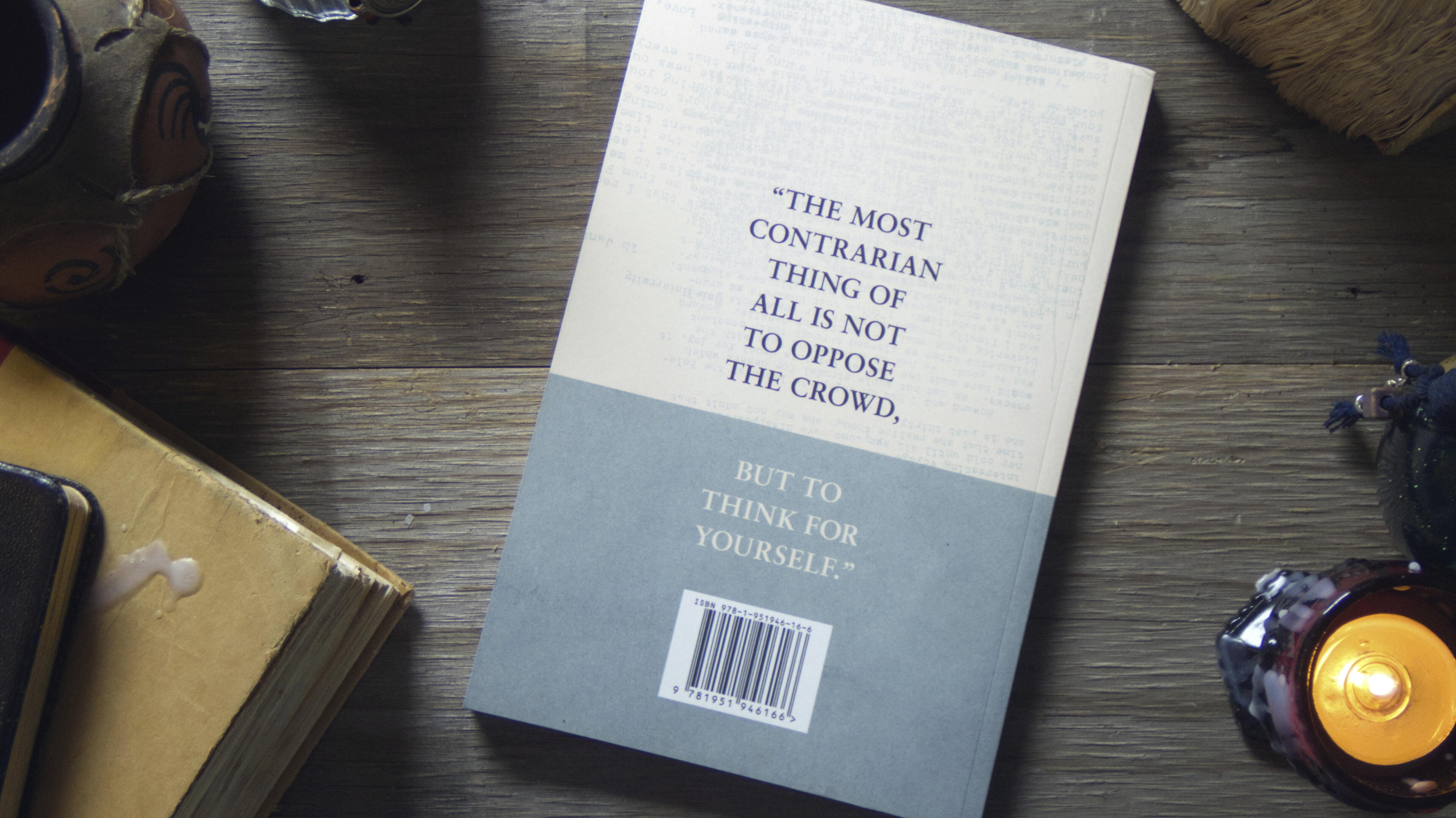 Roger Brown (Back) On the same background, the rear cover reads: "The most contrarian thing of all is not to oppose the crowd, but to think for yourself."
